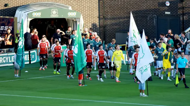 Plymouth and Exeter players walk out of the tunnel
