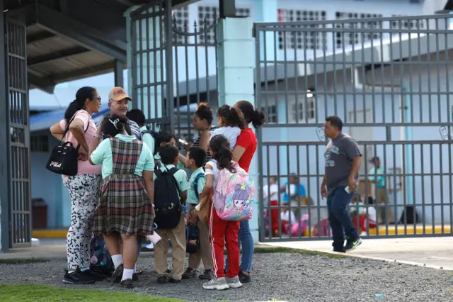 Students evacuating from the Republica de Costa Rica school in La Chorrera, south-west of Panama City