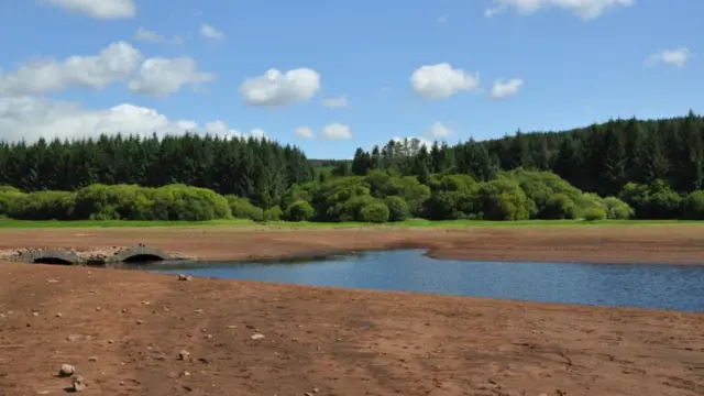 Low water levels at the Llwyn-On reservoir in South Wales revealed an old stone bridge