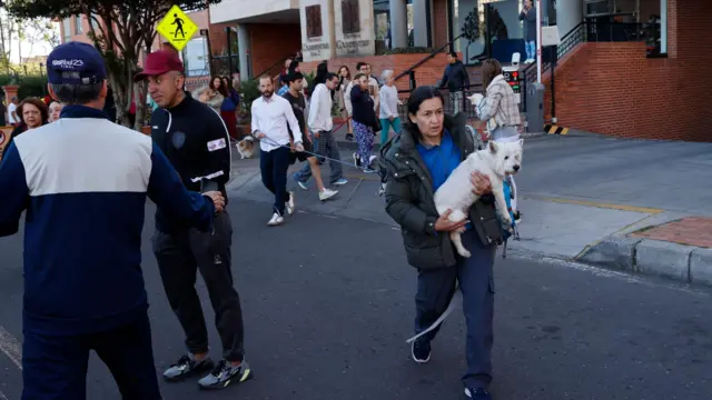 People evacuate buildings in Bogota, Colombia, following a strong earthquake on 10 August 2026.