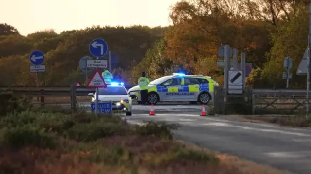 Police cars at the A31