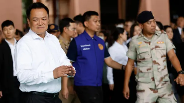 Thai Prime Minister Anutin Charnvirakul arrives to inspect the site following a school shooting