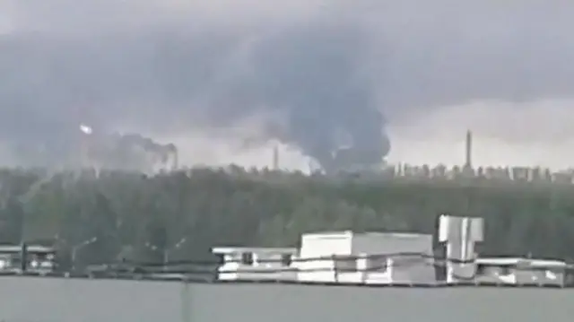 Smoke rises from an oil refinery after a Ukrainian drone attack in Nizhnekamsk, Tatarstan, on Monday