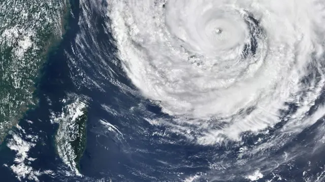 Satellite image shows swirl of clouds that make up Typhoon Dolphin as it heads to China