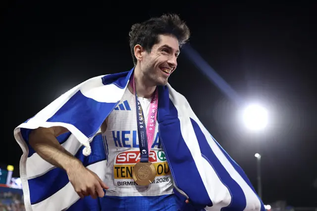 Gold medalist Miltiadis Tentoglou of Team Greece celebrates with the national flag after victory in the Men's Long Jump Final during day two of the 27th European Athletics Championships at Alexander Stadium on August 11, 2026 in Birmingham, England