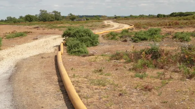 Water pipe across field