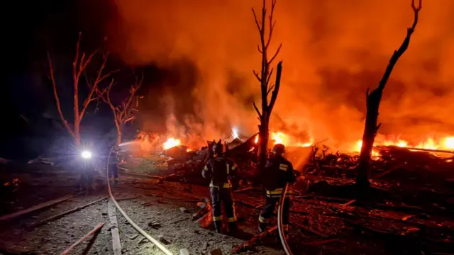 Ukrainian rescuers work at the site of a Russian attack on a residential area in Zaporizhzhia, Ukraine, 11 August 2026