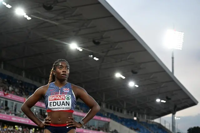 Success Eduan reacts after competing in the women's 200m semi-final