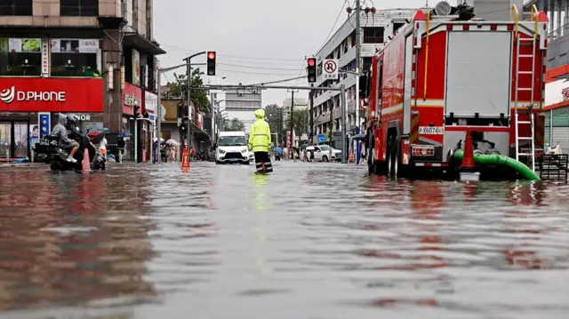 A flooded street in Shanghai China due to Typhoon Dolphin