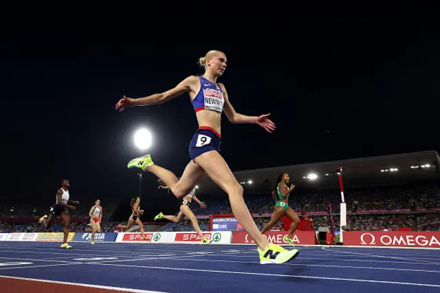 Emily Newnham of Team Great Britain crosses the finish line to win the silver medal in the Women's 400 Metres Hurdles Final during day three of the 27th European Athletics Championships at Alexander Stadium on August 12, 2026 in Birmingham, England