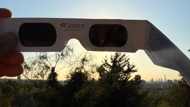 The view of the eclipse through solar spectacles