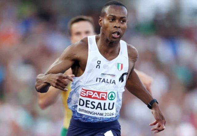 Italy's Eseosa Fostine Desalu crosses the line in first place in the men's 200m semifinal