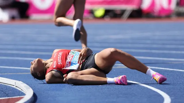 Audrey Werro of Team Switzerland falls on the track during the Women's 800m Semi-Final day four of the 27th European Athletics Championships at Alexander Stadium on August 13, 2026 in Birmingham, England.