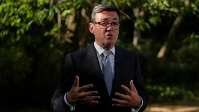 Britain's Prime Minister Andy Burnham speaks to the media after chairing a Cobra meeting at Downing Street on the UK's ongoing response to extreme heat