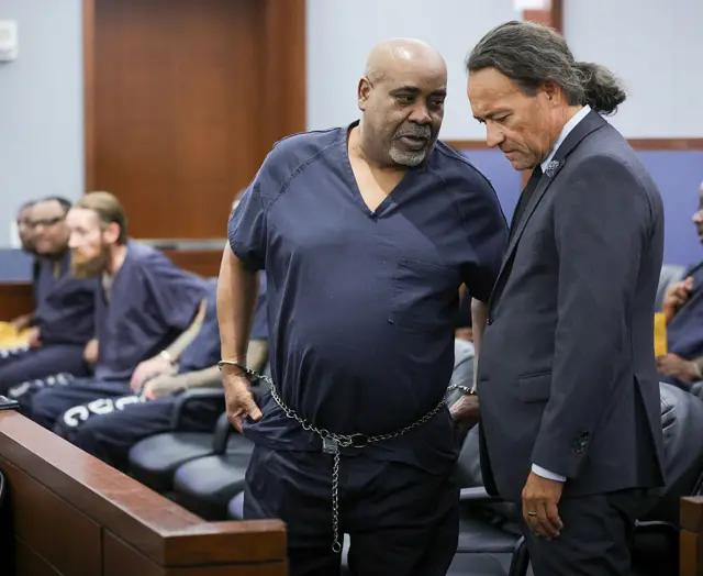 Duane Davis (L) talks with his attorney Michael Sanft in Clark County District Court during a calendar call and motion hearing for Davis' upcoming trial at the Regional Justice Center on August 04, 2026 in Las Vegas, Nevada.