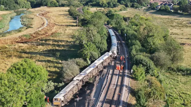 Three rear carriages came off the tracks