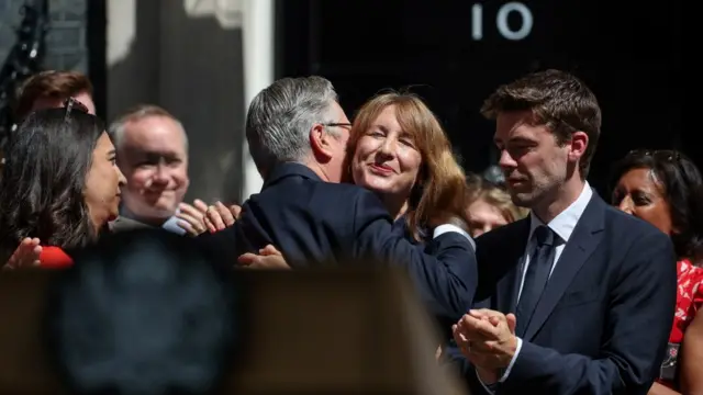 British Prime Minister Keir Starmer embraces Chancellor of the Exchequer Rachel Reeves after delivering a statement outside 10 Downing Street before resigning