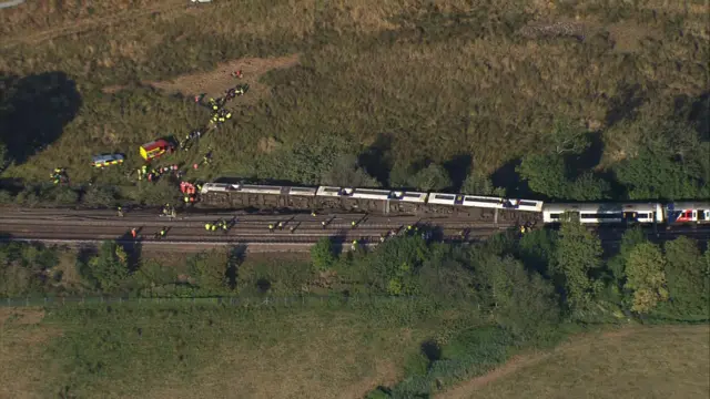 A helicopter shot of a derailed train