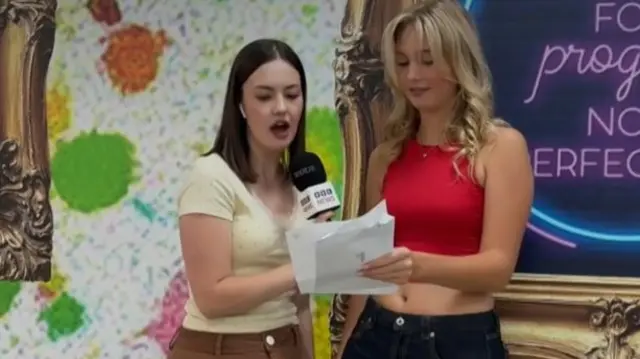 Emily shows the BBC reporter her results