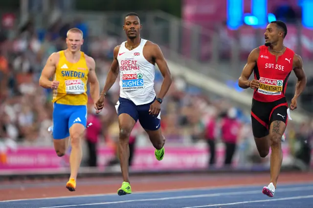 Zharnel Hughes of Team Great Britain and Timothe Mumenthaler of Team Switzerland