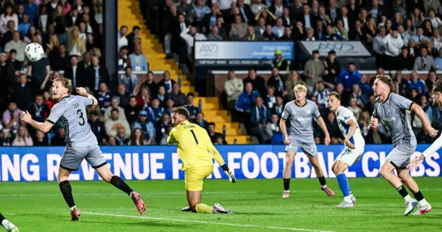 Nicky Clescenco dinks the keeper