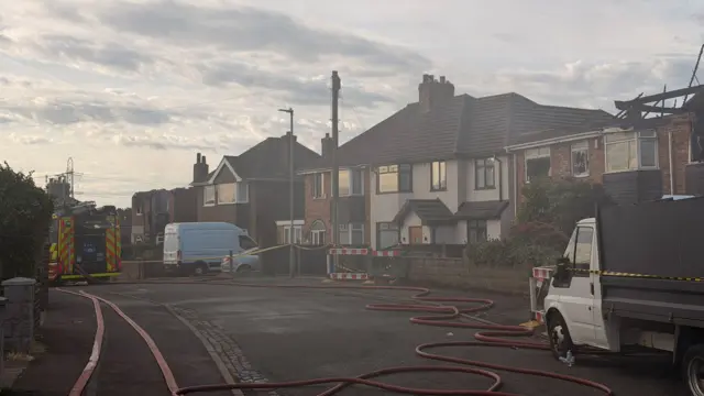 Fire crews at the scene of a blaze on Sandy Road, Stoke--on-Trent