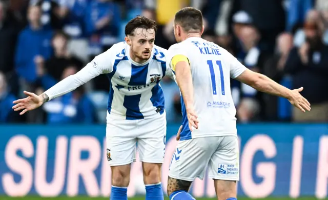 Joe Hugill is congratulated by captain Greg Kiltie