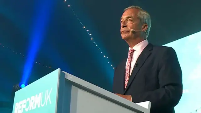 Nigel Farage speaking to Reform supports at an event during the Clacton by-election count