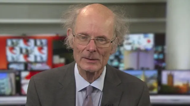 John Curtice looks to camera during a BBC interview