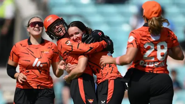Kate Cross of SunRisers Leeds Women celebrates with teammate Lauren Winfield-Hill after taking the wicket of Laura Wolvaardt of Southern Brave