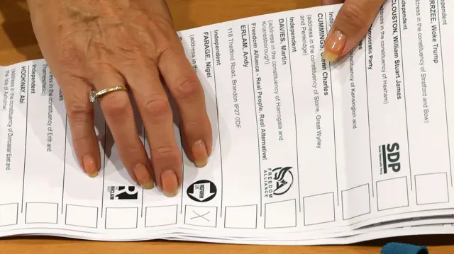 Ballot cards are counted during the Clacton by-election in Clacton-on-Sea, Britain, 13 August 2026