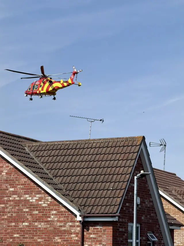 Helicopter flying over a house in Wickford, Essex.