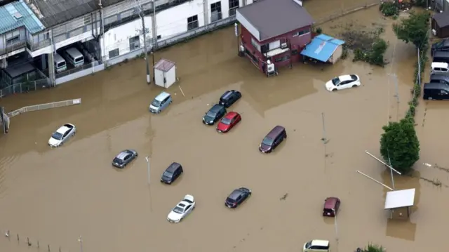 An aerial view of flooded areas after heavy rain in Oamishirasato, Chiba