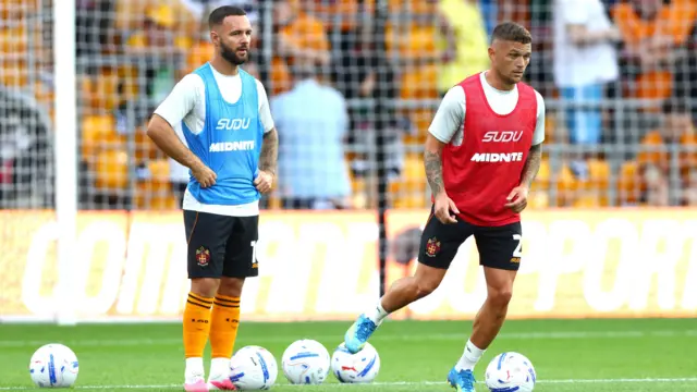 Adam Armstrong and Kieran Trippier in the warm-up for Wolves before their game against Blackburn