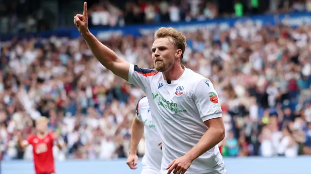 Sam Dalby celebrates scoring for Bolton against Preston