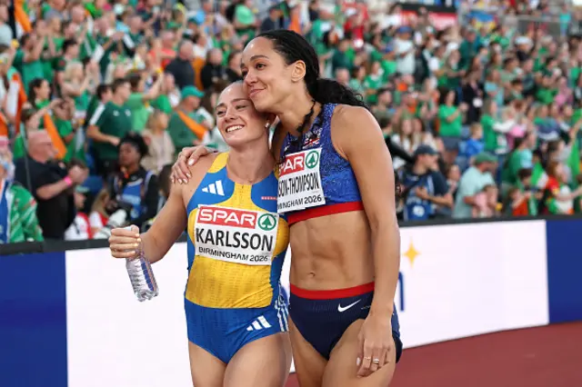 Karlsson of Team Sweden and Katarina Johnson-Thompson look on