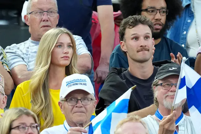 Desire Inglander (L), Wife of Armand Duplantis of Team Sweden and Kurtis Marschall (R), pole vaulter for Team Australia are seen in attendance