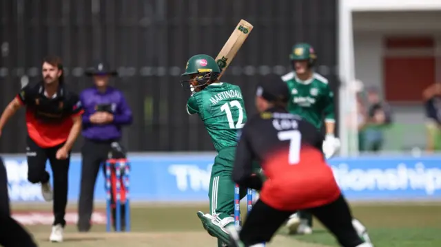 Ben Martindale cuts a four for Notts