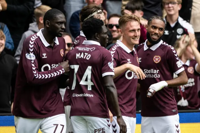 Christian Borchgrevink is surrounded by teammates