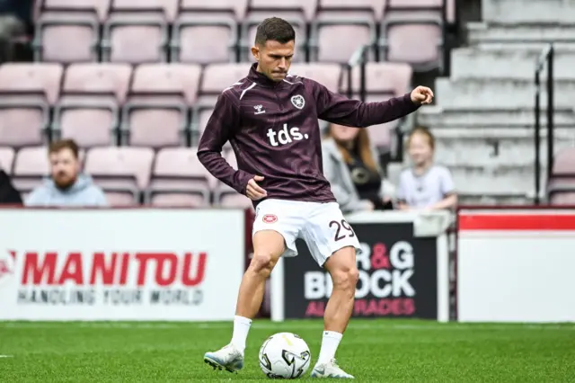 Sabah Kerjota warming up at Tynecastle