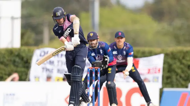Tom Helm hits into the leg side