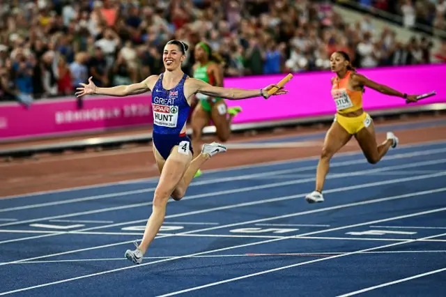 Britain's Amy Hunt celebrates as she crosses the finish line