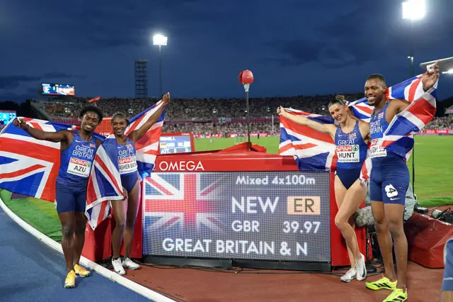 GB's winning 4x100m relay team celebrate their record time