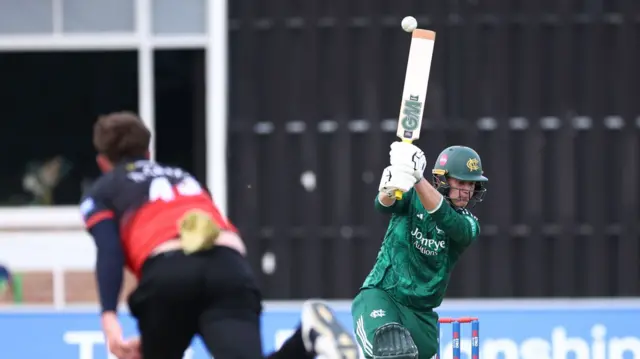 Freddie McCann with an unconventional shot