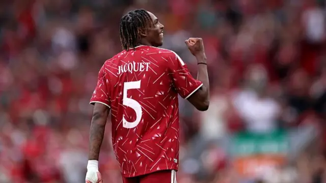Jacquet celebrating