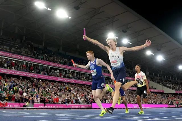 Lorenzo Benati of Team Italy crosses the finish line to win