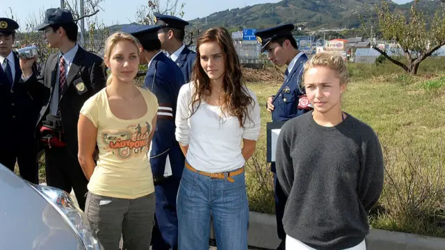 Panettiere stands next to other activists with local Japanese officials behind her