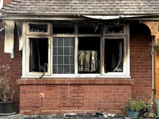Fire damaged house on Racecorse Lane