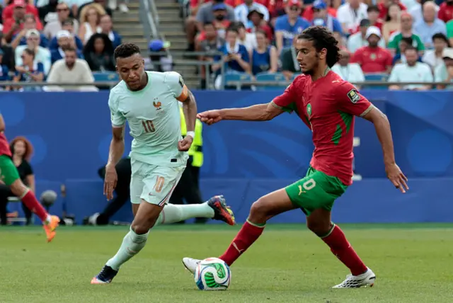 Ayyoub Bouaddi and Kylian Mbappe playing at the World Cup