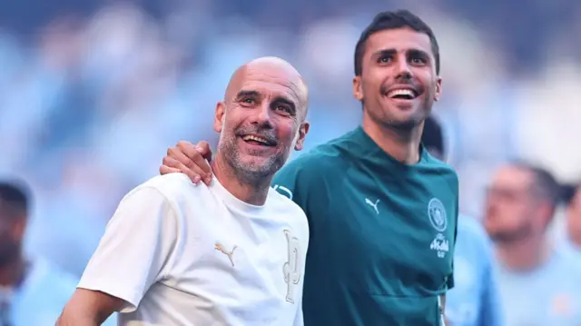 Pep Guardiola and Rodri